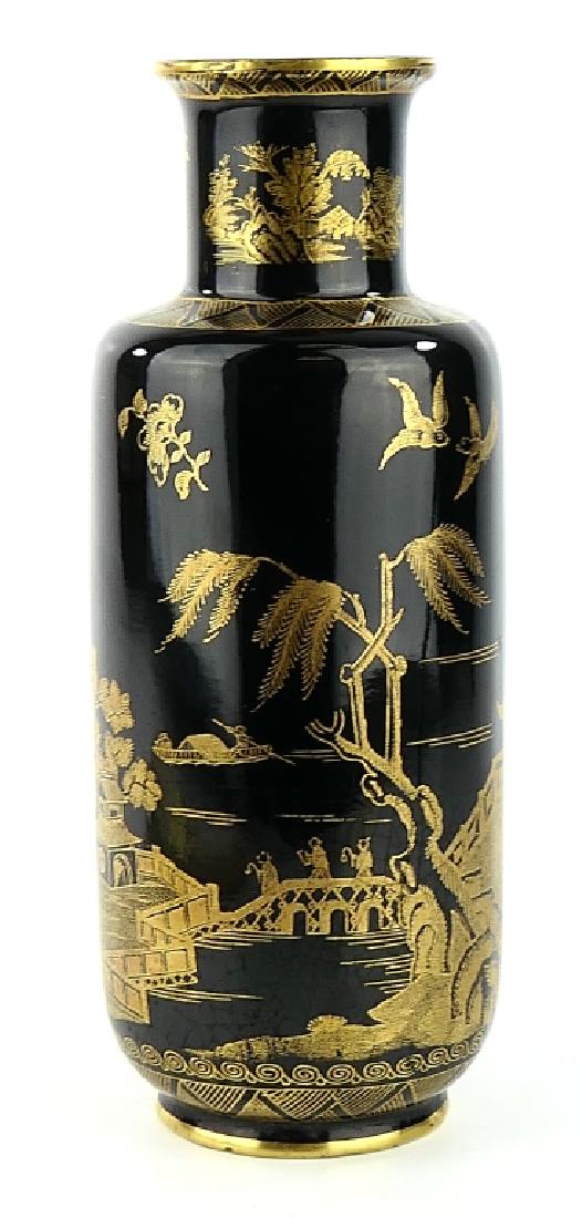 BOOTHS ENGLAND "WILLOW" CHINOISERIE PORCELAIN VASE: Antique Booths English silicon porcelain Chinoiserie "Willow" vase having a black ground with yellow gold landscape scenes. Bottom with brown stamp mark. Measures approx. 9 1/4" height x 3 3/4" diamet