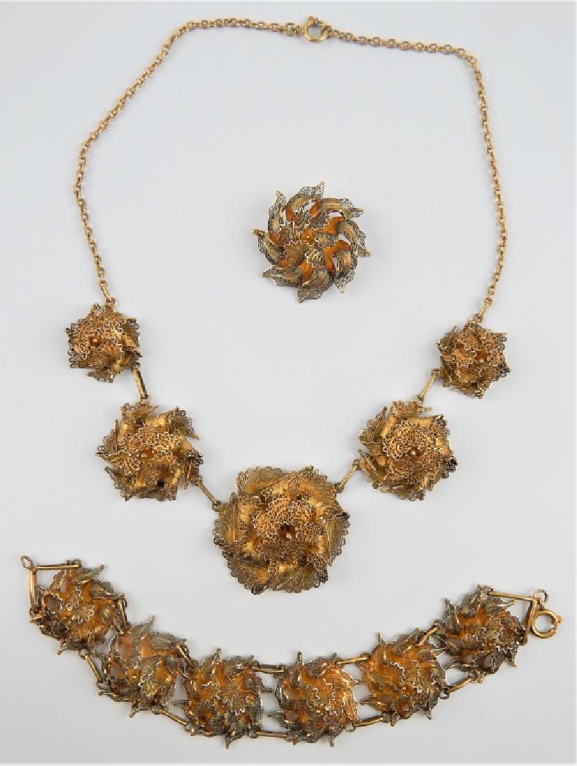 ANTIQUE FRENCH VERMEIL SILVER FILIGREE JEWELRY SET: Absolutely amazing and masterfully crafted very vintage, possibly antique estate jewelry set crafted of French vermeil silver having an intricate three-dimensional cannetille filigree floral design. S