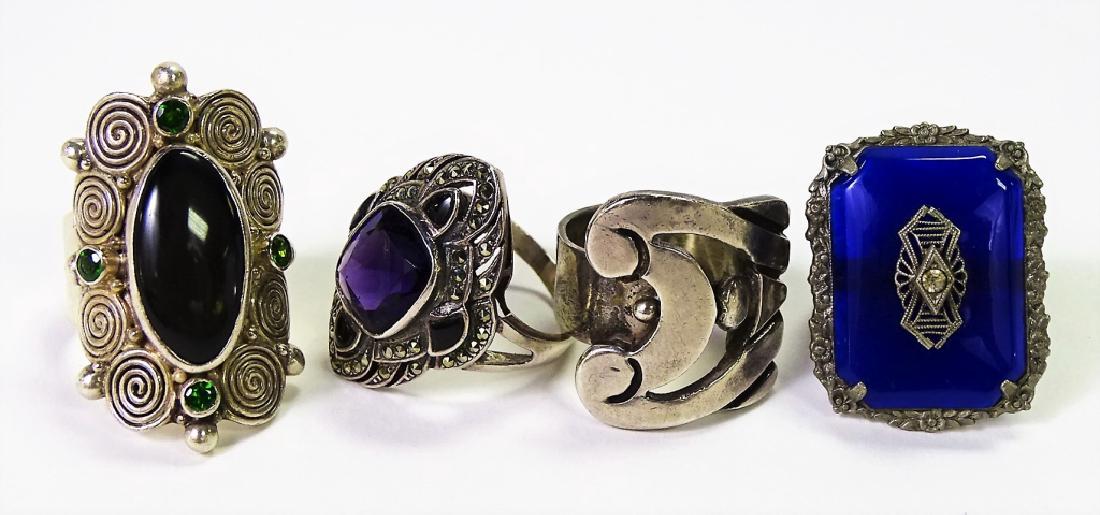 LOT OF 4 FABULOUS ANTIQUE STERLING SILVER RINGS: Enameled, Mexican, Amethyst and Onyx. All mid century. All in fabulous condition. Total weight: 48.4 grams.