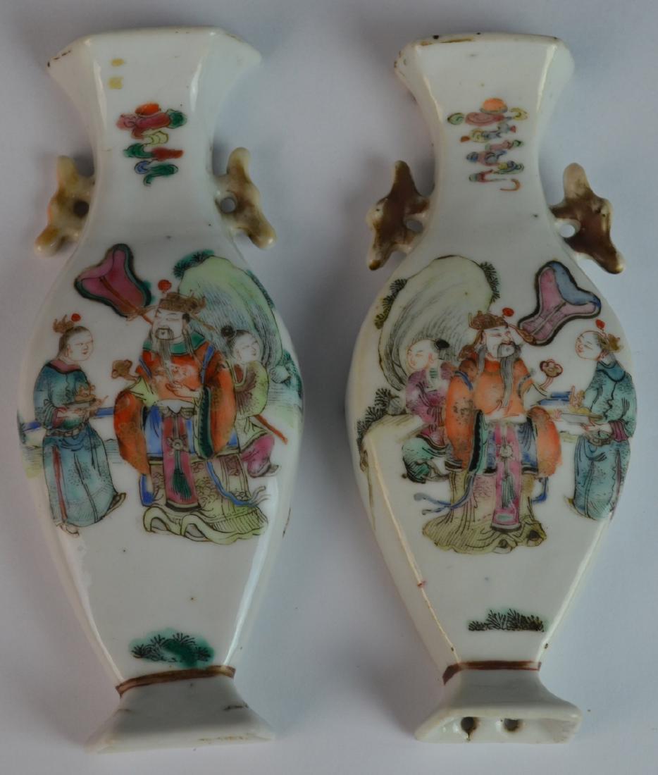 Pr CHINESE FAMILLE ROSE PORCELAIN WALL PLAQUES: A pair of antique Chinese hand painted Famille Rose enamel wall pocket plaques depicting Emperor with acolytes. The Emperor is depicted holding a stalk of lingzhi fungus. Circa late Qing dynsasty peri