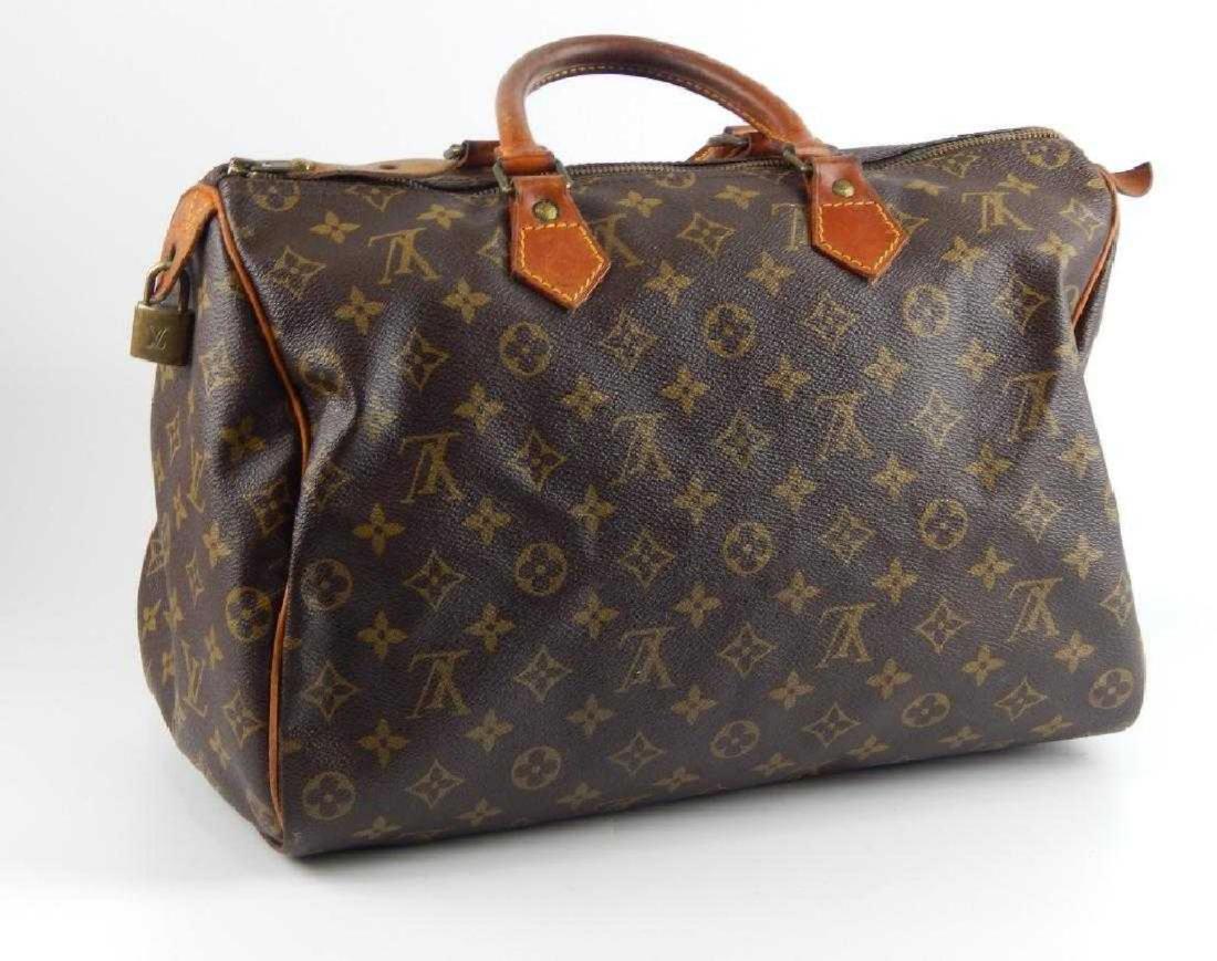 LOUIS VUITTON VINTAGE LEATHER MONOGRAM BAG (1 of 6)