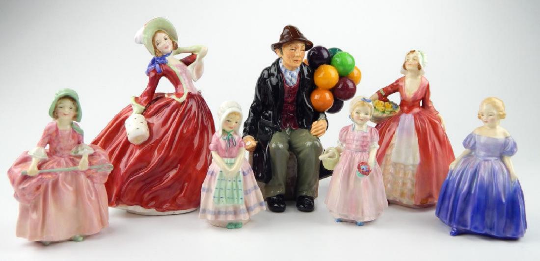 7 ROYAL DOULTON ENGLISH PORCELAIN FIGURES: A lot of 7 Royal Doulton English porcelain figures to include The Balloon Man HN 1954, Autumn Breezes HN1934, Janet HN1537, Marie HN1370, Bo Peep HN1811, Tootles HN1680 and Tinkle Belle Rd. No. 800371