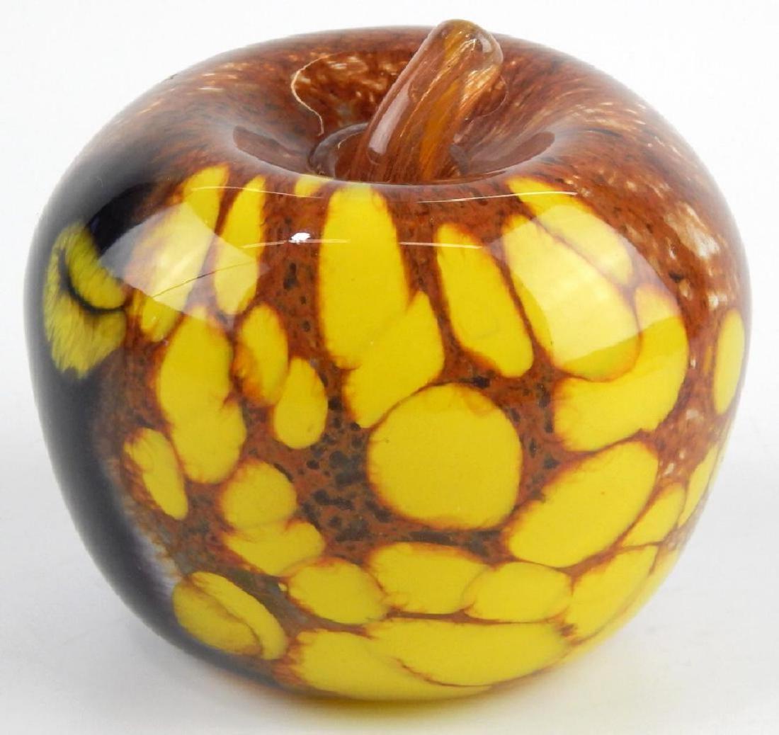GRO HADELAND STUDIO ART GLASS APPLE SCULPTURE: Gro Hadeland hand blown art glass fruit sculpture depicting an apple with yellow, black and brown tones. Signed to bottom. Measures approx. 3 1/2" tall x 4 1/4" diameter (8.9cm x 12.8cm).