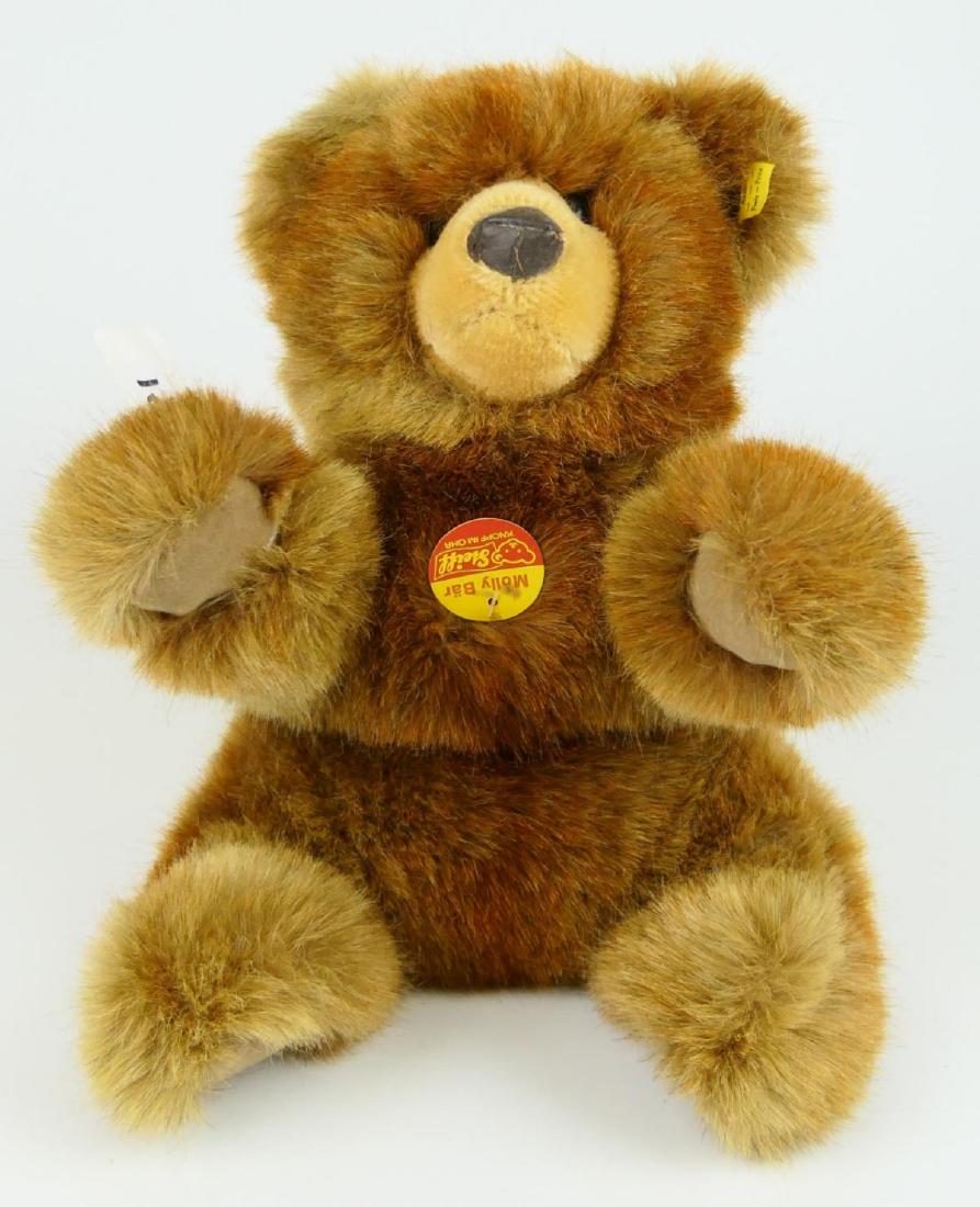 VINTAGE STEIFF MOLLY BAR STUFFED PLUSH DOLL: 1980's Steiff plush "Molly Bär" doll, #0330/32, done in brown acrylic/cotton blend. Cloth tag and button present. Made in Austria. Measures approx. 11-1/2" height.