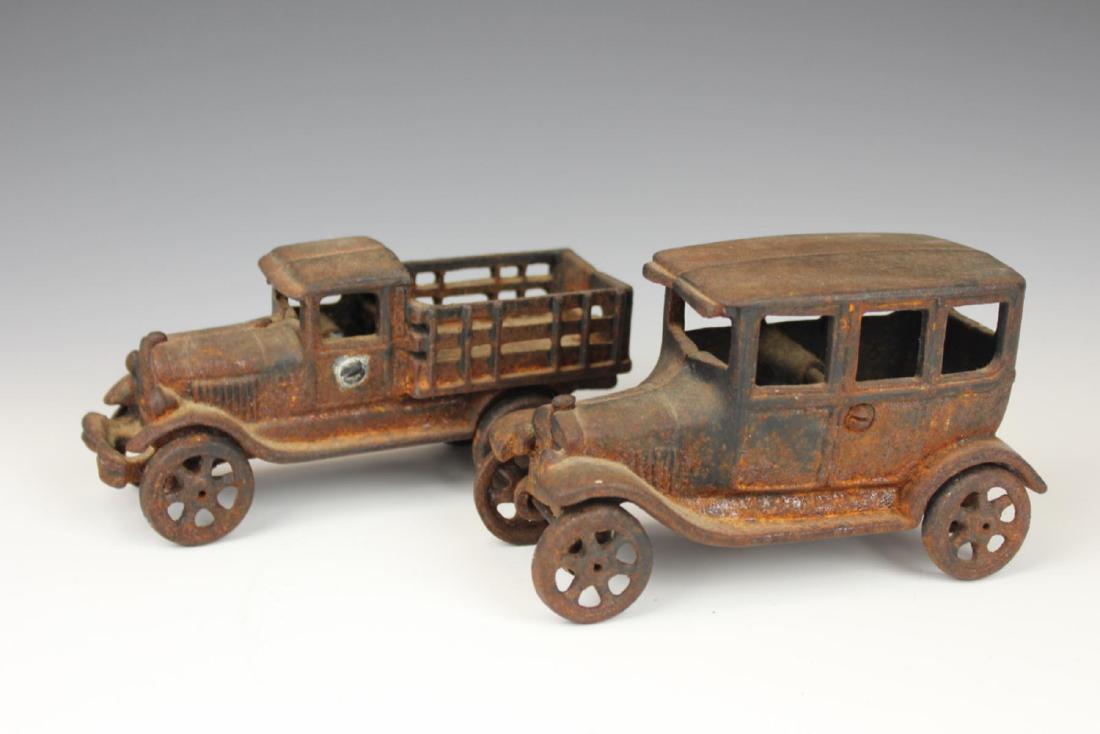 (2) ANTIQUE CAST IRON TOY TRUCKS (1 of 1)