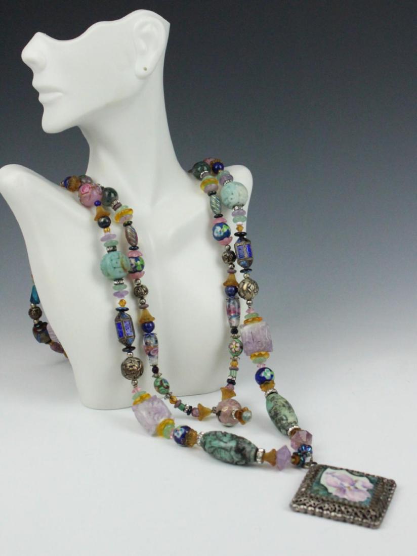 HEAVY STERLING ETHNIC NECKLACE WITH PRECIOUS STONE: Measures a large 32" long, double strand, with quartz, jade, turquoise, and enamel beading throughout. Absolutely breath taking. Property of Palm Beach lady. Very heavy third party shipping required