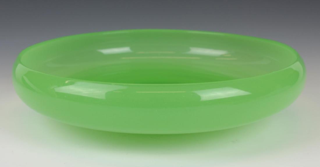 EMERALD OPALINE GLASS CENTERPIECE BOWL: Vintage possibly antique emerald opaline art glass centerpiece bowl with low foot. Measures approx. 11 1/2" diameter x 2 3/4" height (29.2cm x 6.9cm).