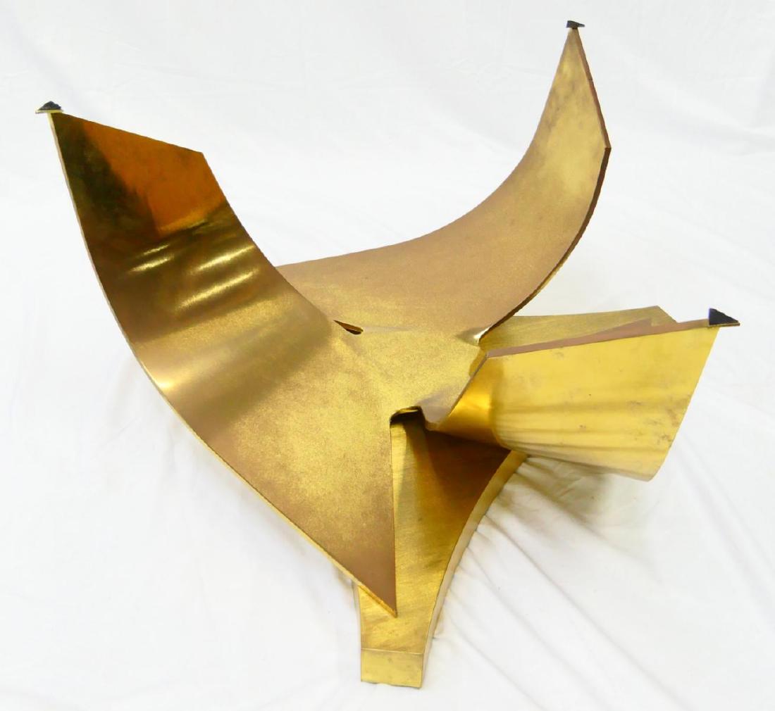 Ron Seff Propeller form Brass Cocktail Table: Ron Seff Propeller form Brass Cocktail Table. A striking Modern free form coffee table featuring a gilt brass base with round glass top. Measures 17" height x 48" diameter (43.2cm x 121.9cm) at glass
