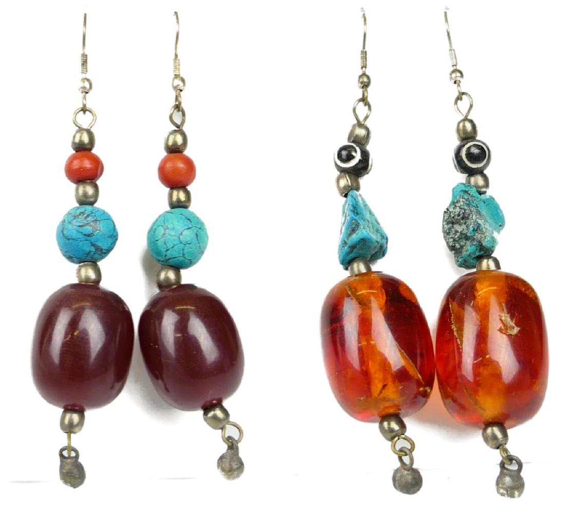 DAVID SAITY 2 SETS OF NATIVE AMERICAN EARRINGS: Each set about 2 1/2" long one with amber and turquoise, one with turquoise and stone David Saity, who made his Manhattan jewelry store famous for selling the biggest and brightest examples of America