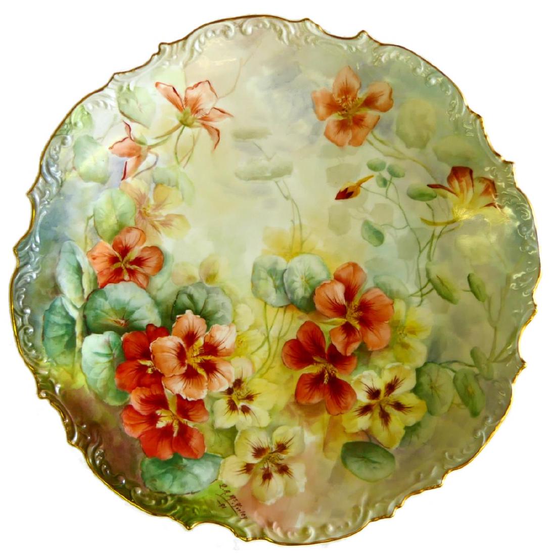 Wm GUERIN LIMOGES HAND PAINTED 15" FLORAL CHARGER: Antique William Guerin Limoges French hand painted porcelain scalloped rim round charger. Signed "L. A. McGinley" and dated 1891. Measures approx. 15" diameter (38.1cm).