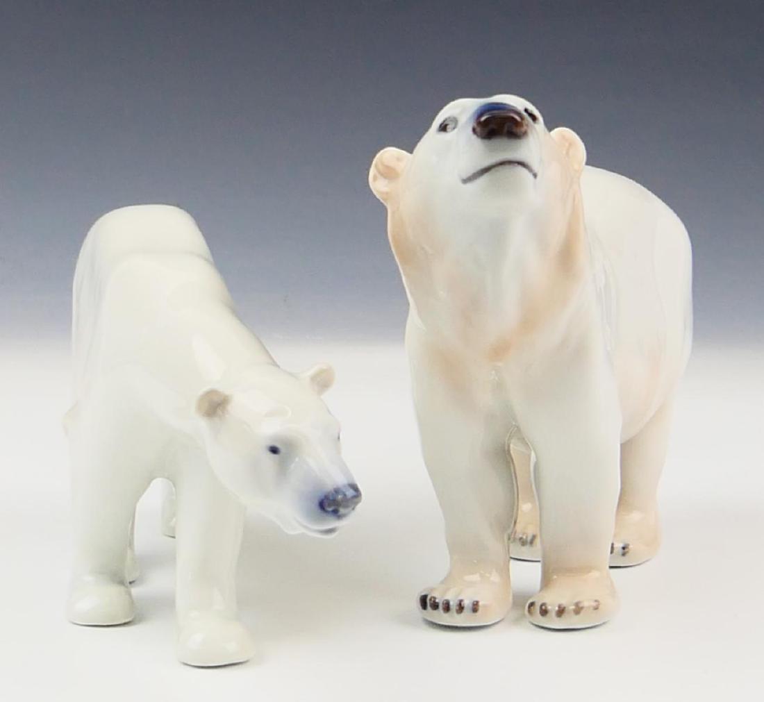 2 ROYAL COPENHAGEN PORCELAIN POLAR BEAR FIGURES: A lot of 2 Royal Copenhagen Danish porcelain animal figures depicting standing polar bears. Each marked to bottom; one signed NN and numbered 417, the other numbered 320. Tallest approx. 5 1/2" height