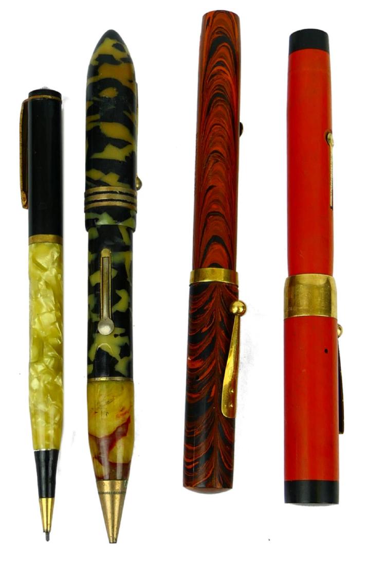 4 VINTAGE CELLULOID BAKELITE PENS & PENCIL: A lot of four vintage celluloid or bakelite fountain pens and a mechanical pencil. Includes New Banker, Ideal and Morrison's brands. Longest approx. 6" (15.2cm).