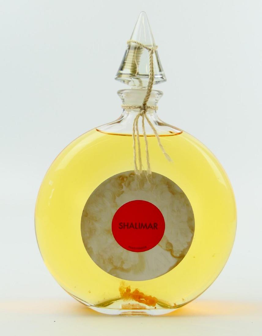 SHALIMAR BY GUERLAIN FACTICE PERFUME BOTTLE: Shalimar by Guerlain factice perfume bottle. Measures approx. 11 3/4" height x 8" weight (29.8cm x 20.3cm).