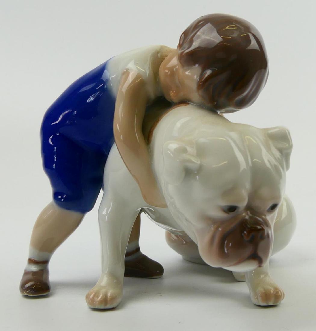 BING & GRONDAHL "BOY WITH BULLDOG" SCULPTURE 1790: Bing & Grondahl Danish porcelain sculpture depicting a "Boy with Bulldog". Hallmarked and numbered 1790 to bottom. Measures approx. 4" height (10.2cm).