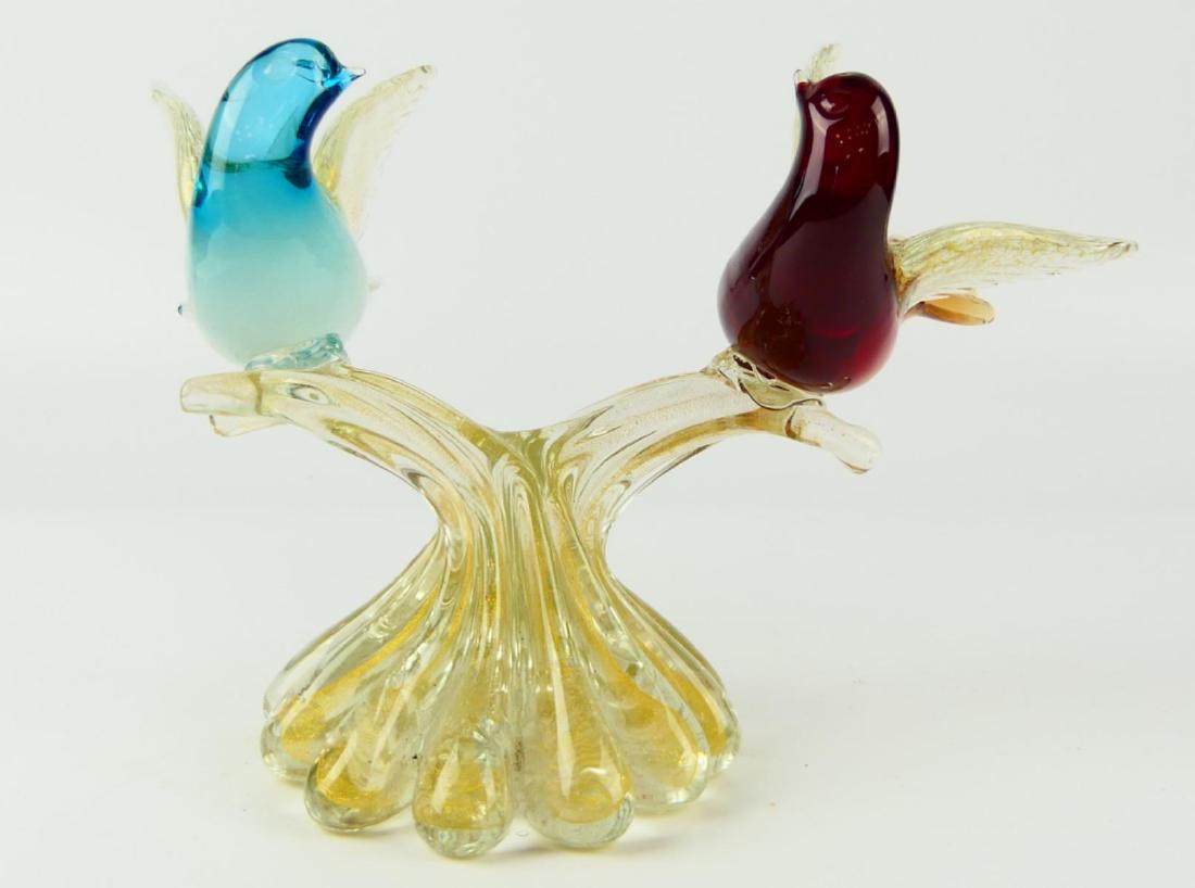 MURANO AQUA & RUBY ART GLASS BIRDS ON BRANCHES: A vintage Murano hand blown art glass sculpture depicting aqua and ruby glass birds with gold flecked wings perched on clear glass branches, also with gold flecking. Measures approx. 18 1/4" height x 