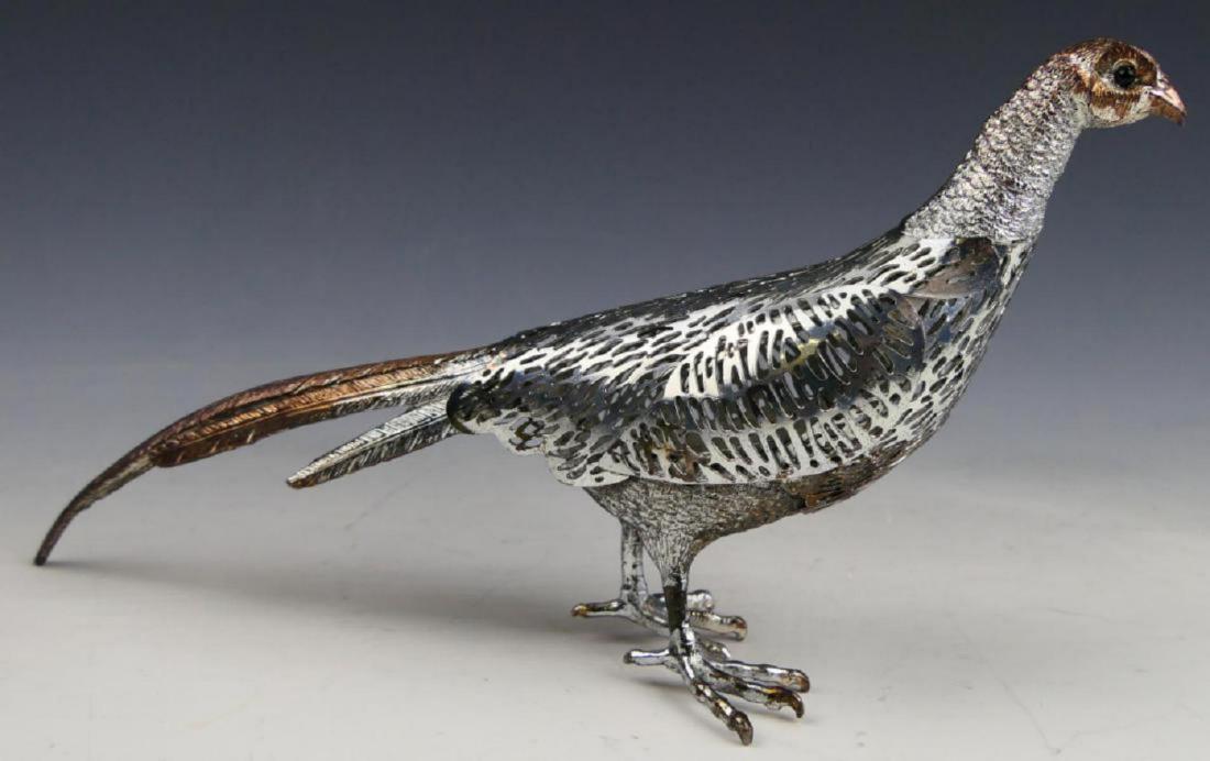 CHRISTOFLE SILVER PLATED PIERCED BIRD SCULPTURE: CHRISTOFLE SILVER PLATED PIERCED BIRD SCULPTURE, marked to bottom. Measures 6 1/4" length.