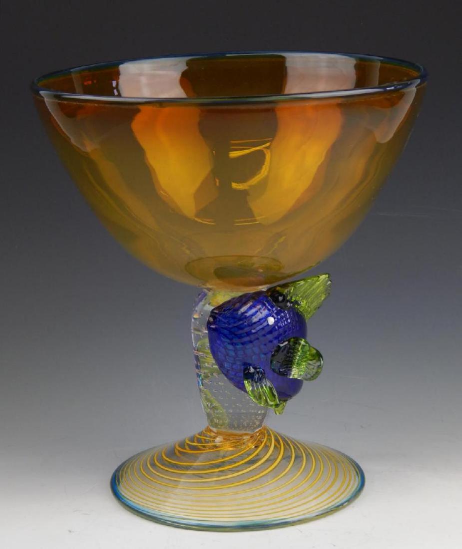 GREEN RIVER GLASS CO LARGE ART GLASS COMPOTE: 2001 GREEN RIVER GLASS CO LARGE ART GLASS COMPOTE , applied glass fish along stem of base. Signed to the bottom. Measures 10" height by 8 1/2" width.