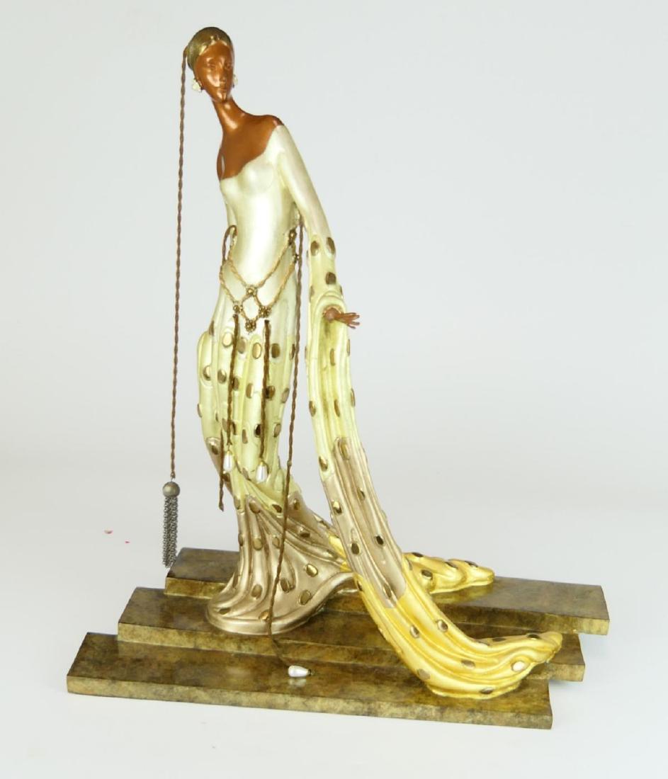 ERTE (FRENCH 1892-1990) "MELISANDE" BRONZE FIGURE: Romain De Tirtoff "Erte" (FRANCE / NEWY YORK / RUSSIAN FEDERATION, 1892 - 1990) bronze sculpture titled "Melisande" depicting a woman in dress with long draping cuffs and polka design. Erte signature