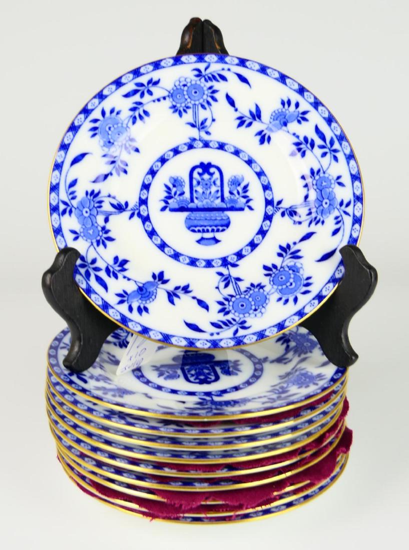 10 MINTON ENGLAND "DELFT" GOLD TRIM B&B PLATES: A set of 10 Minton English porcelain "Delft" pattern bread and butter plates having the gold trim. Each measures approx. 6 1/8" diameter (15.5cm).