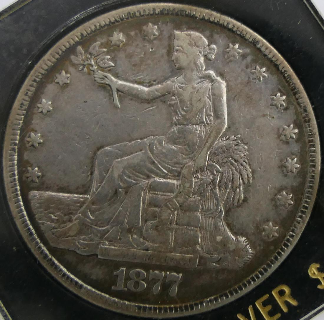 1877 U.S. TRADE SILVER DOLLAR IN SLAB (1 of 4)