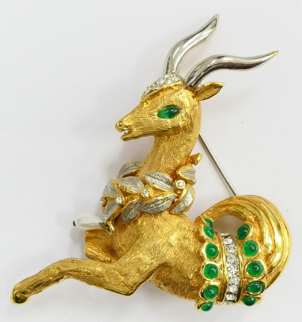 KENNETH J LANE VINTAGE REINDEER WITH FAUX JEWELS: Measures just over 3" wide, signed KJL , circa 1970's excellent condition , rare pin. Third party shipping required
