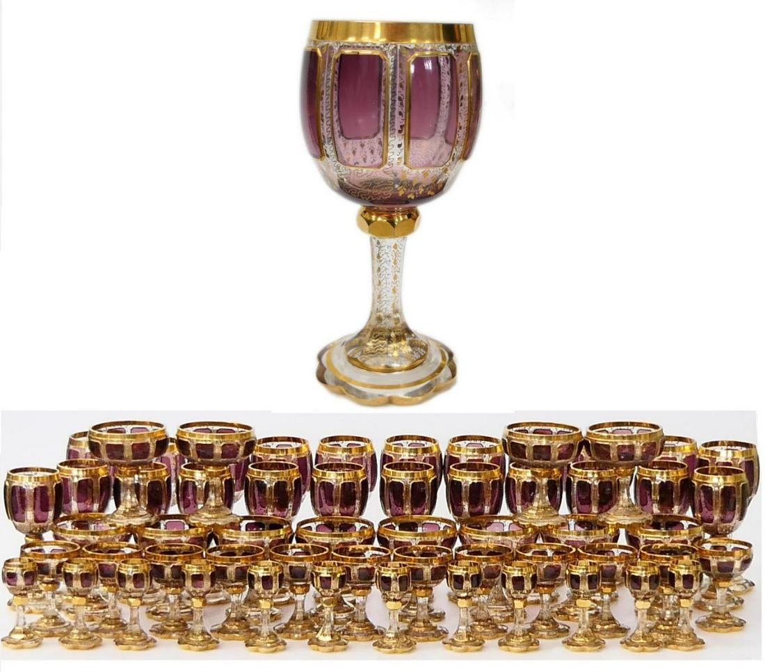 EXTRAORDINARY ANTIQUE MOSER CRYSTAL WINE SET (59): The most fabulous set we have ever offered. A 59 piece Impressive and rare collection of Bohemian Moser Glassworks Crystal goblets from the late 19th century. Decorated in a Neo Classical style with M