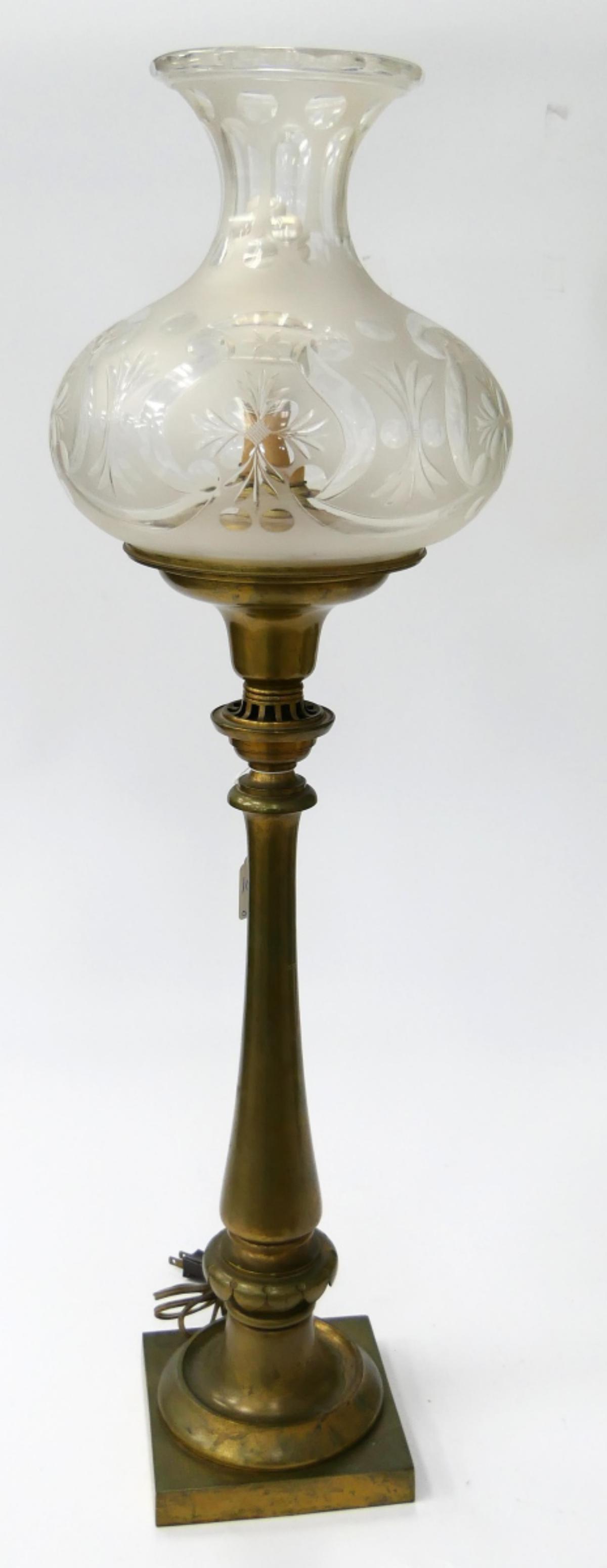 GILT METAL STICK TABLE LAMP WITH FROSTED SHADE: Vintage, possibly antique, gilt metal stick form table lamp holding a frosted glass globe shade. Measures approx. 32 3/4" height (83.2cm) overall including shade.
