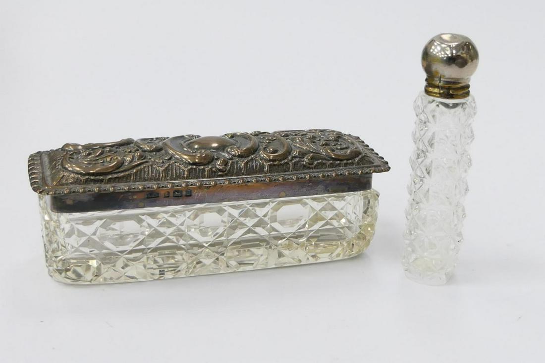 2 ANTIQUE STERLING AND GLASS LADIES VANITY ITEMS: To include : a perfumer with silver top,measures 3" tall, along with a FABULOUS small casket of cut crystal with English covered top. Box measures 4 1/2" long and 1 1/2" wide. excellent condition thir