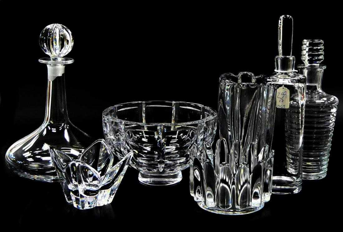 LOT OF 7 ORREFORS CRYSTAL DECANTERS BOWLS VASE: A lot of 7 Orrefor's Swedish clear crystal tableware items to include 3 decanters with stoppers, 1 console bowl, 2 candy bowls and a vase. Tallest piece approx. 12 1/8" height (30.8cm).