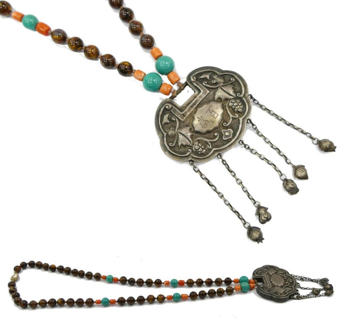 CHINESE ANTIQUE SILVER TIGER EYE CORAL NECKLACE: measures 24" long, with 3" silver pendant. Attached to the pendant are hanging silver flower buds. 45 tiger eye beads each about 5MM each. with 6 turquoise beads similar size, and 12 smaller size bead