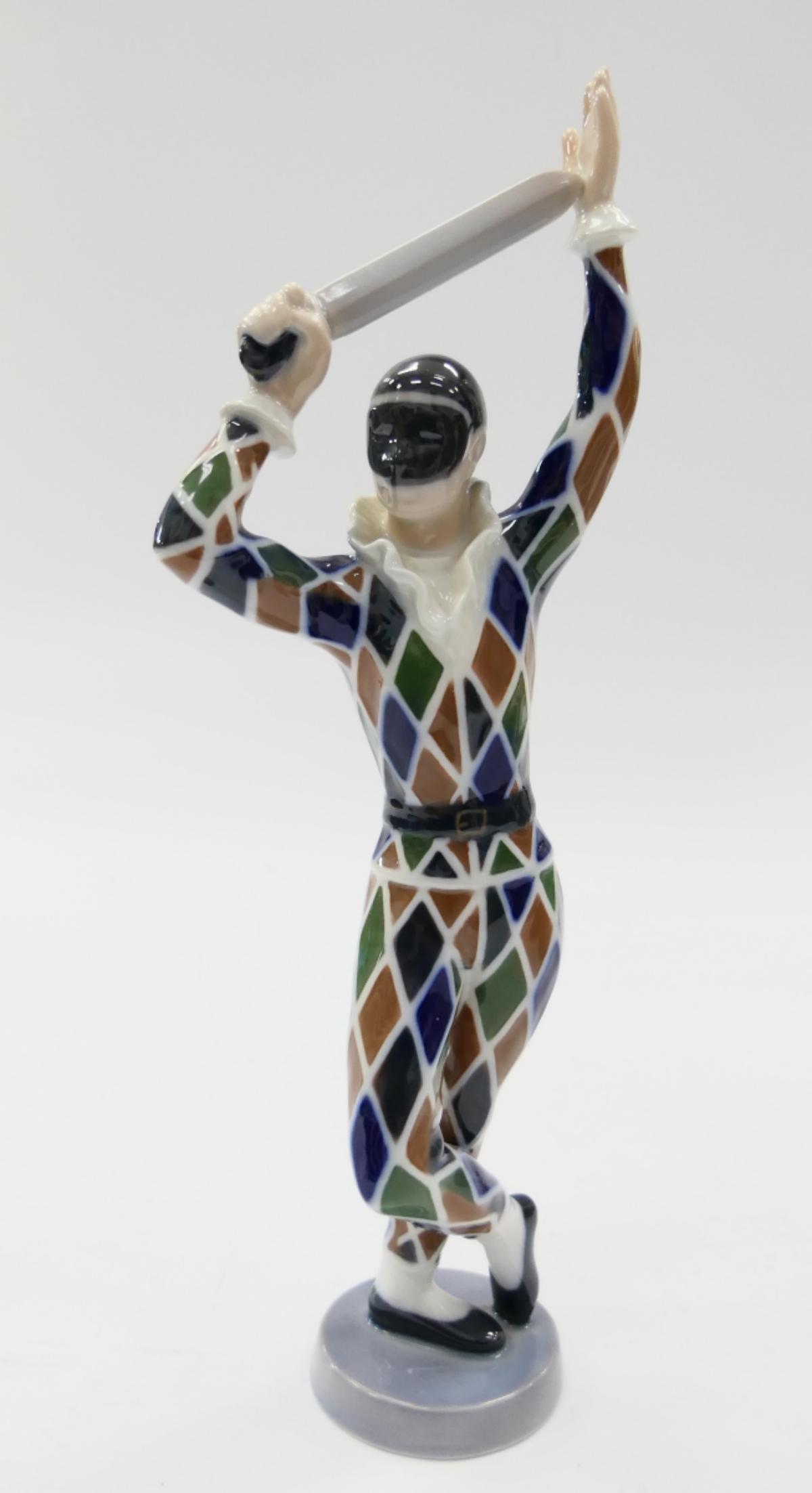 BING & GRONDAHL HARLEQUIN WITH SWORD #2354: Measures 11 1/4" tall in very fine condition. Third party shipping required