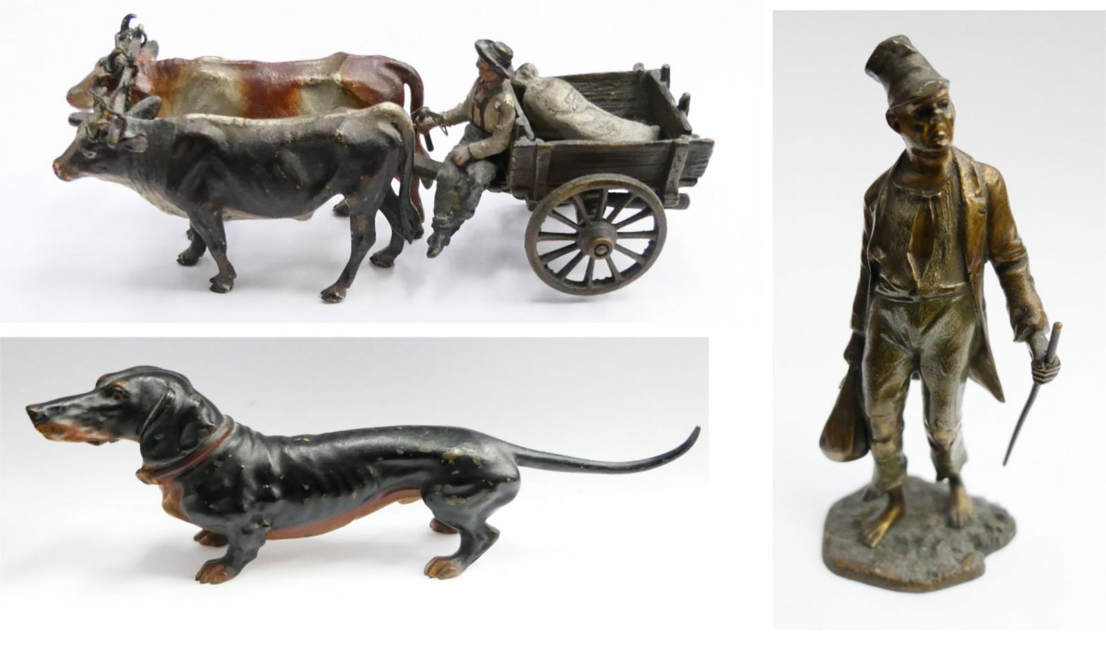3 ANTIQUE COLD PAINTED AUSTRIAN FIGURINES INC BERGMAN: To include;Metal figurine 4 1/4" man pulling a wagon, a Bergman carpet bagger standing 3 1/2" tall, and a austrian cold painted dachshund dog 6" long. Nice lot here Third party shipping required