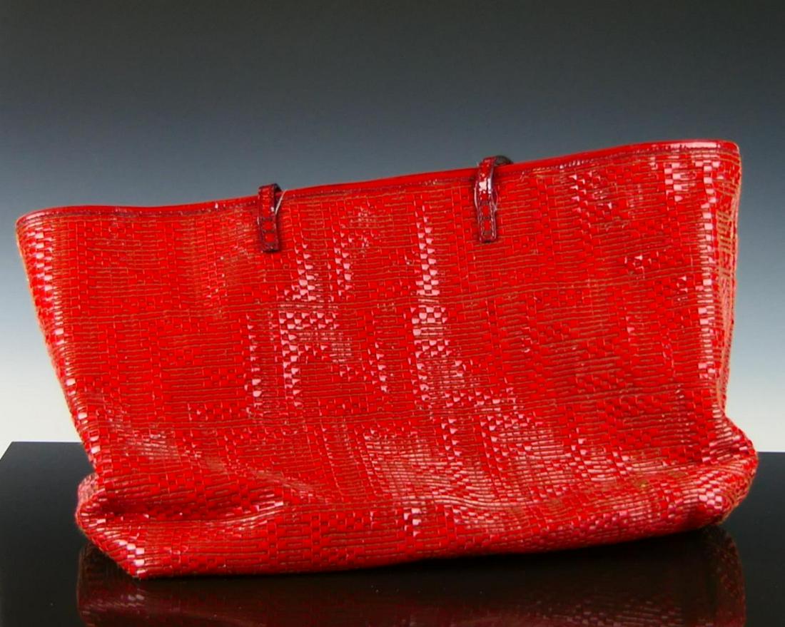 FENDI RED WOVEN PATENT LEATHER SHOULDER BAG PURSE: Fendi red woven patent leather shoulder bag tote purse. Black fabric interior with one zippered pocket and two open pockets. Measures approx. 9 1/2" height x 15" width x 6" depth (24.1cm x 38.1cm x 15