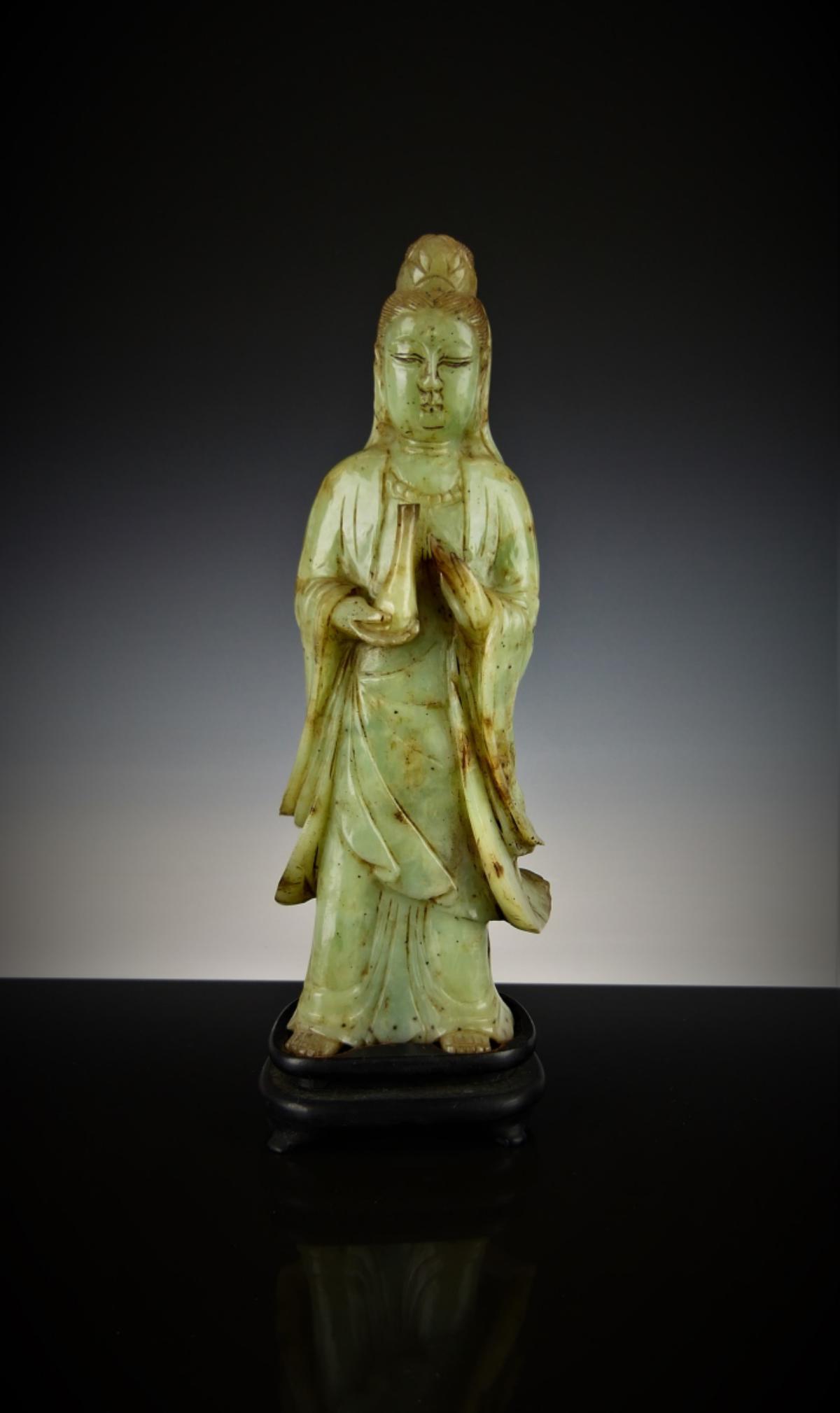 CHINESE ANTIQUE JADE QUAN YIN STANDING FIGURINE: Measures about 9 1/4" tall, has a fitted wooden base. She is standing and holding a vase. Very good condition for age. Third party shipping required