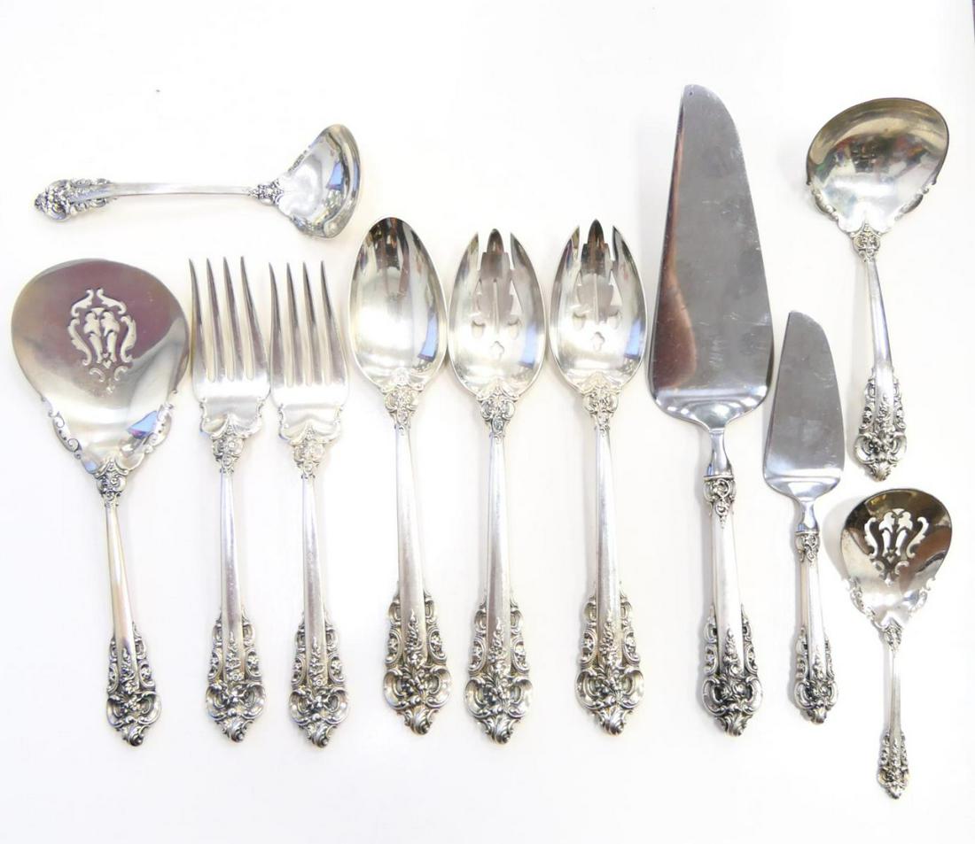 WALLACE GRANDE BAROQUE (11) STERLING SERVING PIECE: Consists of 2 serving forks 8" each, 2 spoons 9" each, large sterling spoon 9" , 2 ladles, small and large pie server, and 2 servers. Total weight of the items about 28 OZT. Third party shipping requi