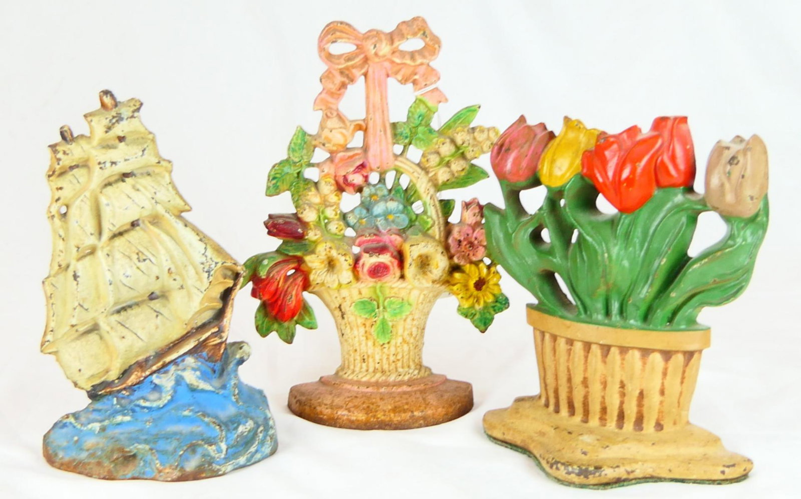 (3) ANTIQUE CAST IRON FLORAL DOORSTOPS (1 of 5)