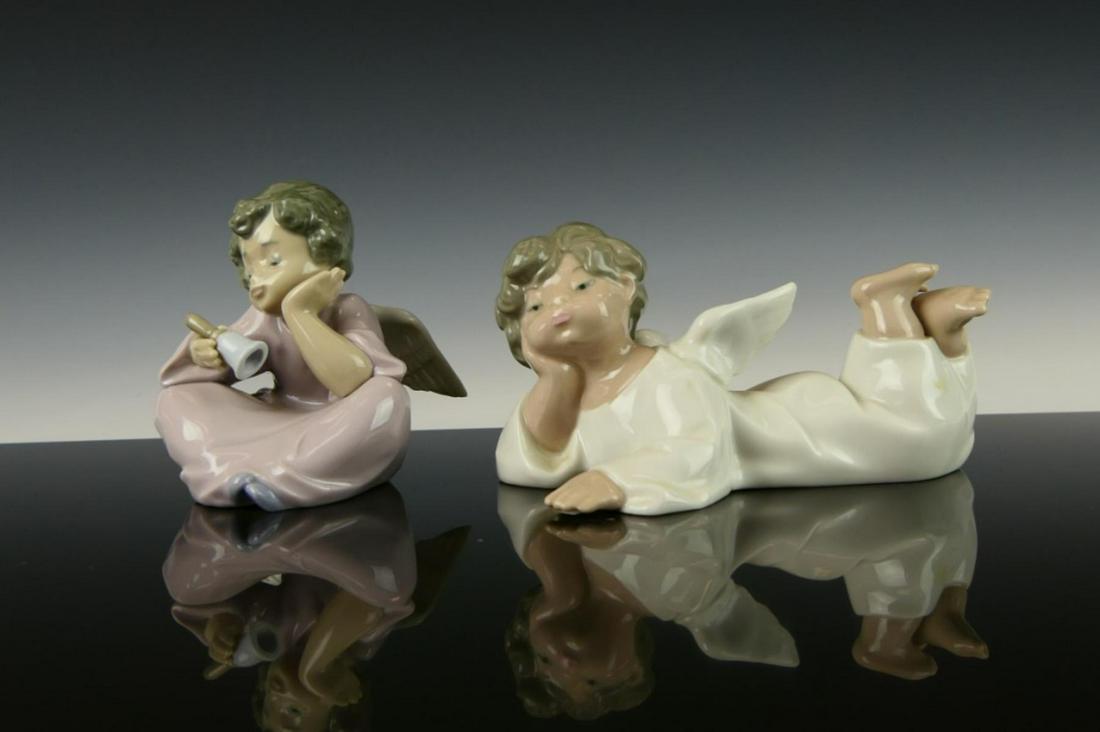 2 LLADRO SPANISH GLAZED PORCELAIN ANGEL FIGURES: A lot of 2 Lladro Spanish glazed porcelain angel figures to include "Angel, Reclining" #4541 and "Heavenly Chimes" #5723. Tallest measures approx. 3 1/2" height (8.9cm).