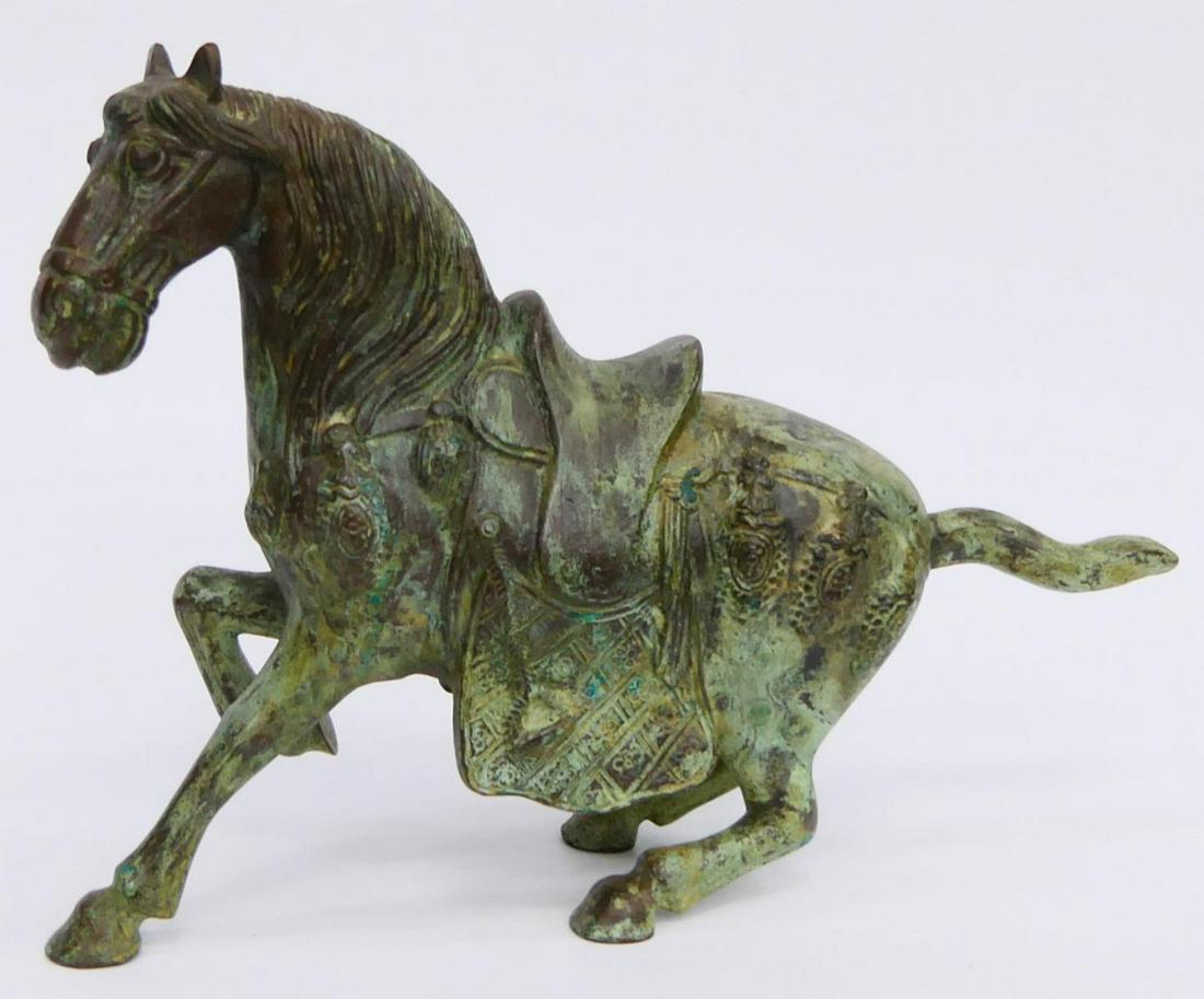 LARGE BRONZE STATUE OF A TANG HORSE: Large bronze with green patina. Measures 14" long and 12" tall. No signature found . Very heavy Third party shipping is required for this lot