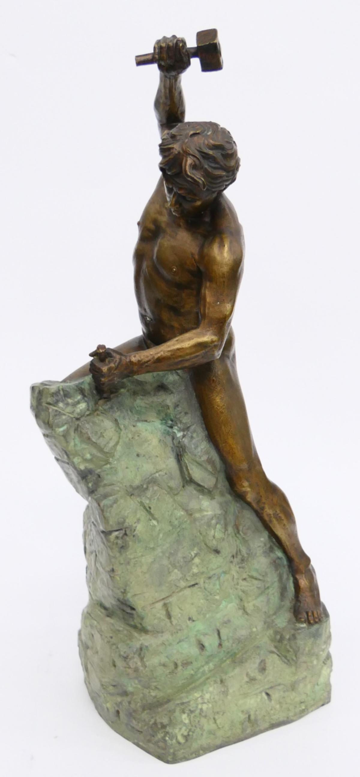 LARGE CONTEMPORARY BRONZE OF A BLACKSMITH ESPINO: He is standing on a rock doing his trade. Measures 24" tall, of a blacksmith. Bronze and green patina. Signed Carlos Espinio 2003 heavy and large. Third party shipping is required for this lot