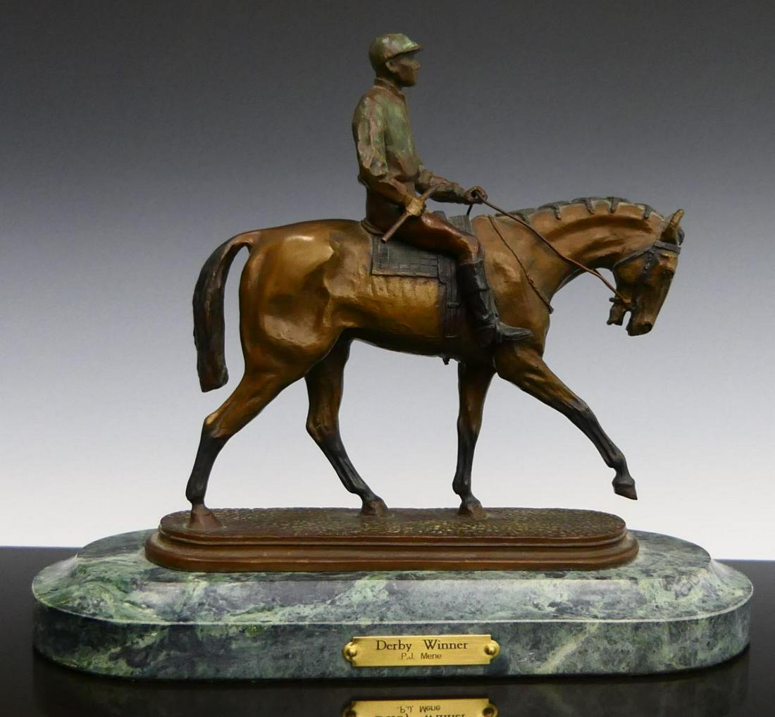 AFTER P.J.MENE BRONZE STATUE OF THE DERBY WINNER: Horse and jockey. Measures about 7" tall and 7" wide. Beautifully mounted on a green marble base . Third party shipping is required for this lot