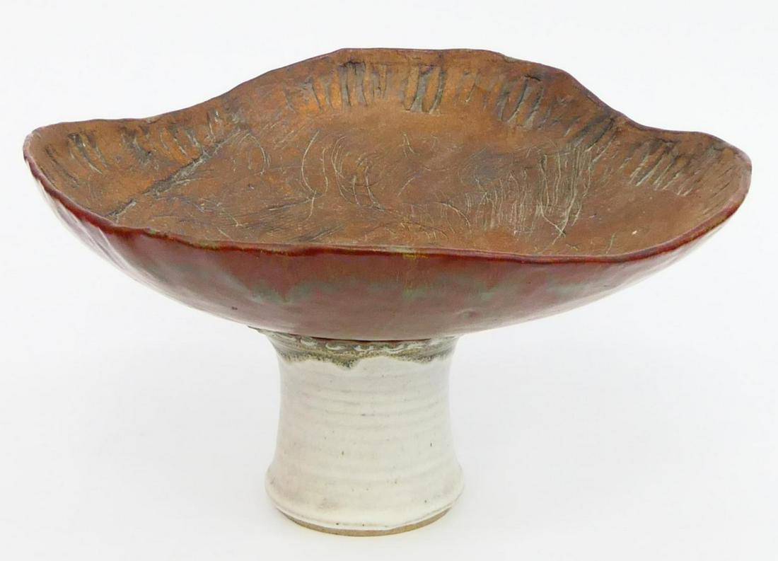 LARGE POTTERY PEDESTAL BOWL UNSIGNED: This item is unsigned thus we have no idea who the maker is. We will have numerous photos for you. Pedestal is glazed white, while bowl is earthenware brown. Measures 9" tall and 14" wide. Third party