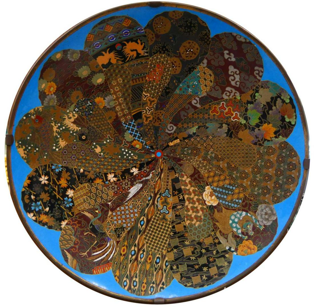 FINE JAPANESE EDO CLOISONNE ENAMELED 18" CHARGER: A antique Japanese cloisonne enameled metal charger having a floral design with fine patters, koi fish, clouds, foo lions, pheonix, floral blooms and more. Futher decorated to underside. Probably circ