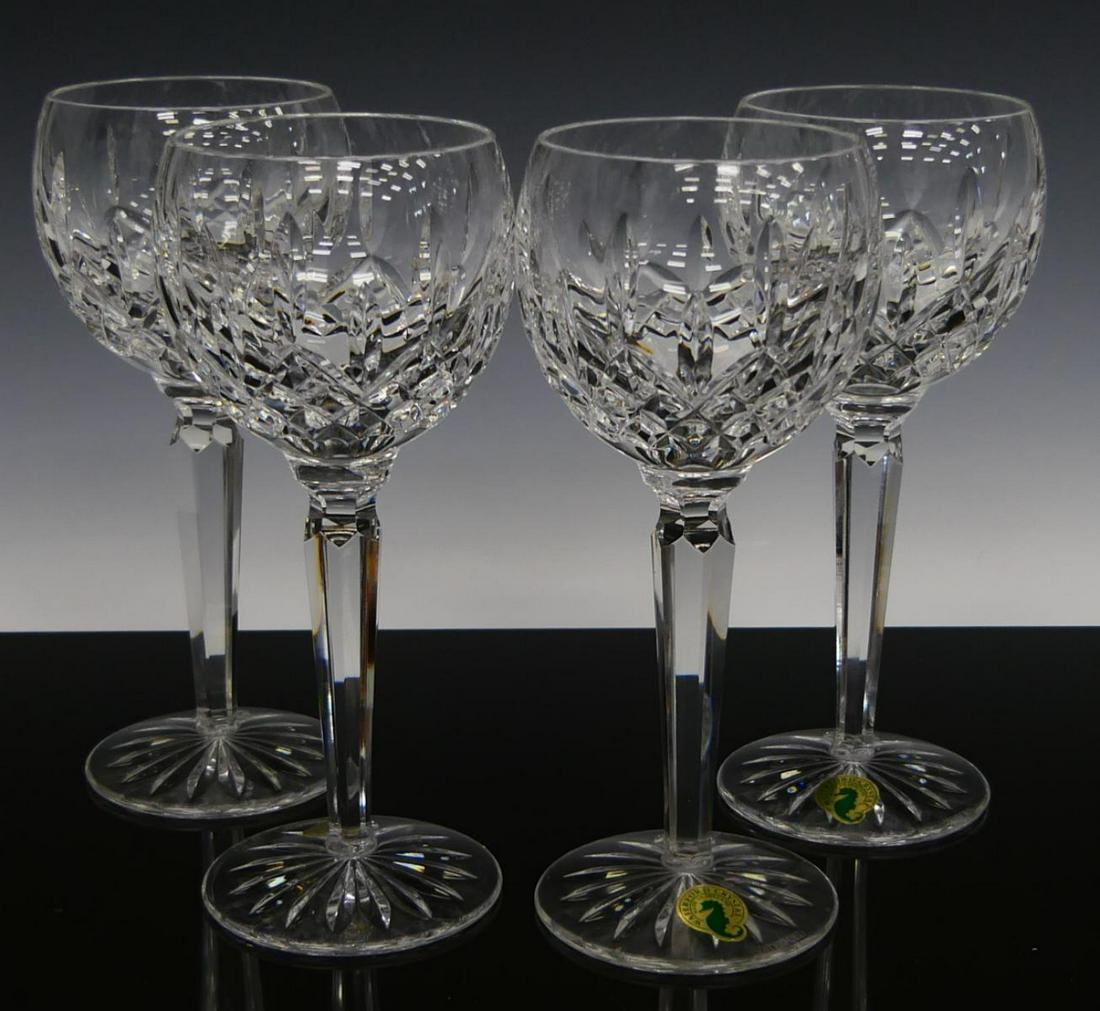4 WATERFORD LISMORE CRYSTAL WINE HOCK STEM GLASSES: A set of 4 Waterford Irish cut crystal wine hock stemware glasses. Measures approx. 7 3/8" height (18.7cm).