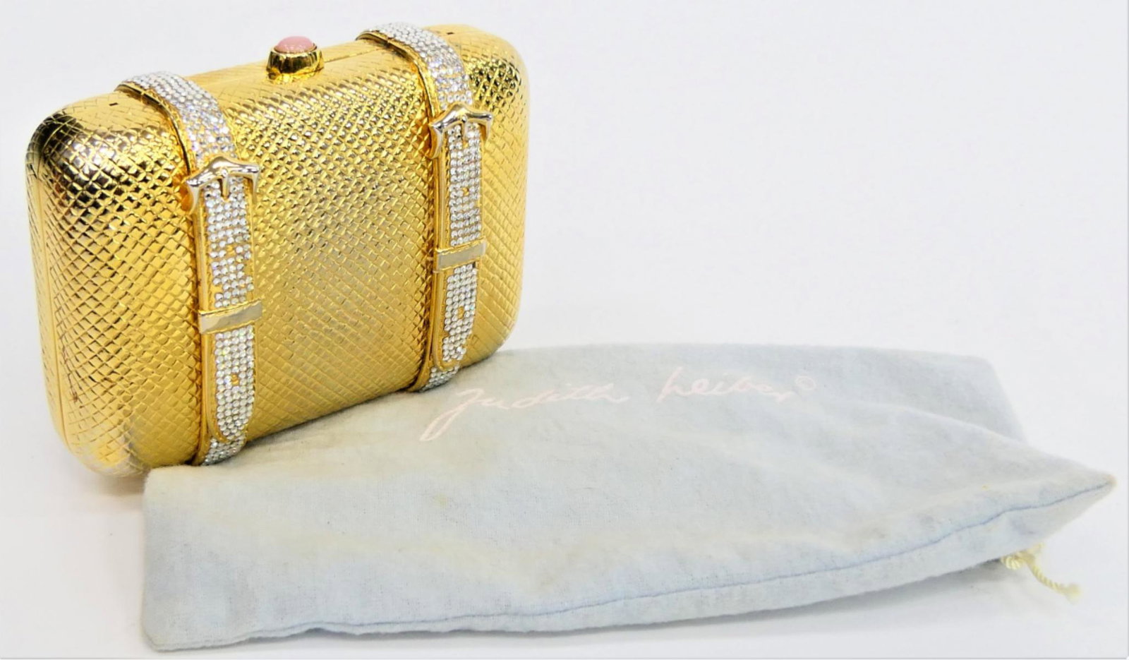JUDITH LEIBER GOLD RHINESTONE VINTAGE CLUTCH: Complete with mirror and accessories. Measures 5 1/2" wide and 4" tall. Comes with dust bag. Property of a Miami Beach Estate. Third party shipping required