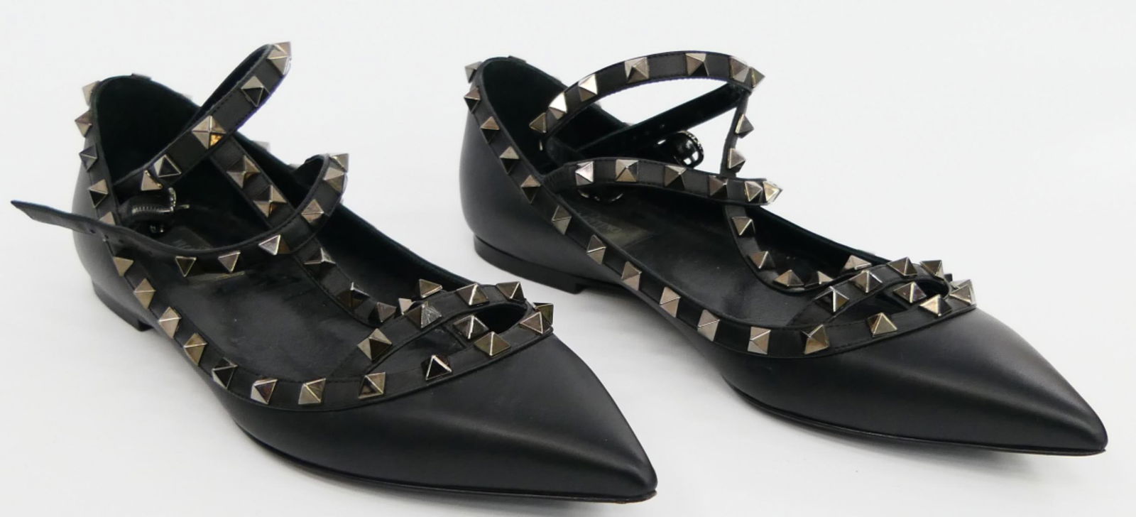 VALENTINO BLACK LEATHER LOAFERS WITH SPIKES: Size 39 1/2. Property of a Hollywood runway model. Third party shipping is required