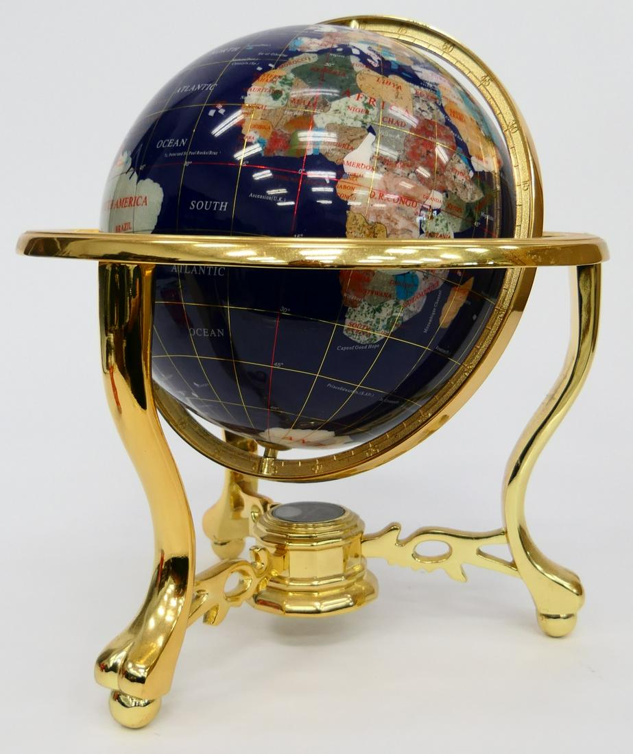 MULTI STONE INLAID GLOBE w METAL MOUNT & COMPASS: A Multi-stone inlaid globe having a gilt metal mount and compass. Measures approx. 13 1/2" height x 13" diameter (34.3cm x 33cm) overall including mounting.