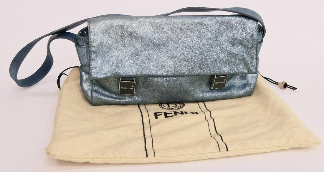 FENDISSIMIE SMALL ROBINS EGG BLUE MAGNETIC PURSE: Measures 9" wide and 5" tall, comes with fendi dust bag. Third party shipping required