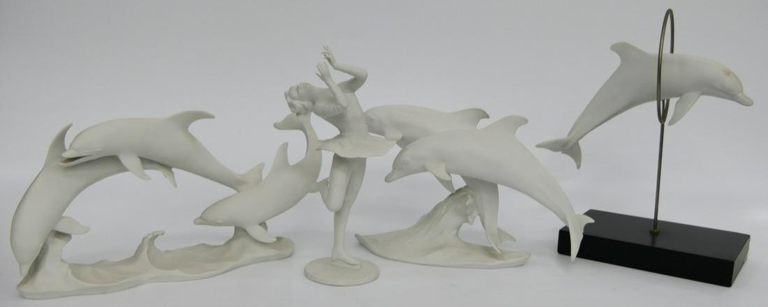 4 KAISER GERMANY BLANC DE CHINE FIGURES: A lot of three Kaiser German blanc de chine matte porcelain figures to include 2 dolphin groups designed by Wolfgang Gawantka, a dolphin jumping through hoop and an ice skater designed by Gerhard Boch