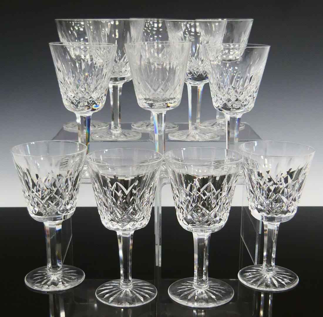 WATERFORD SET OF 12 RED WINE GLASSES: Measures 5 7/8" tall, appears to be Lismore pattern. Third party shipping required