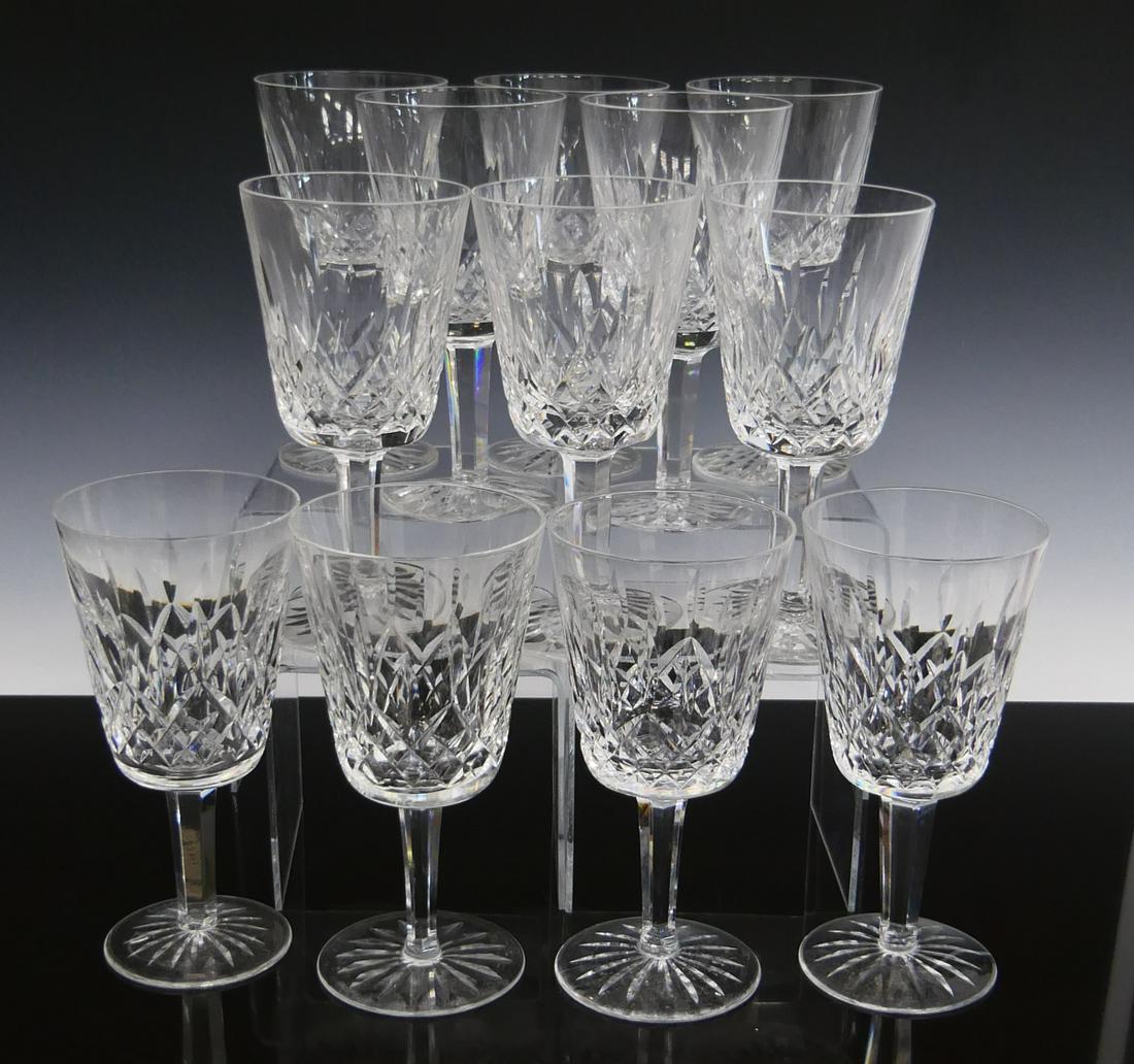 LOT OF 12 WATERFORD WHITE WINE GLASSES: Each measures about 6 7/8" tall, appears to be Lismore pattern. Third party shipping required